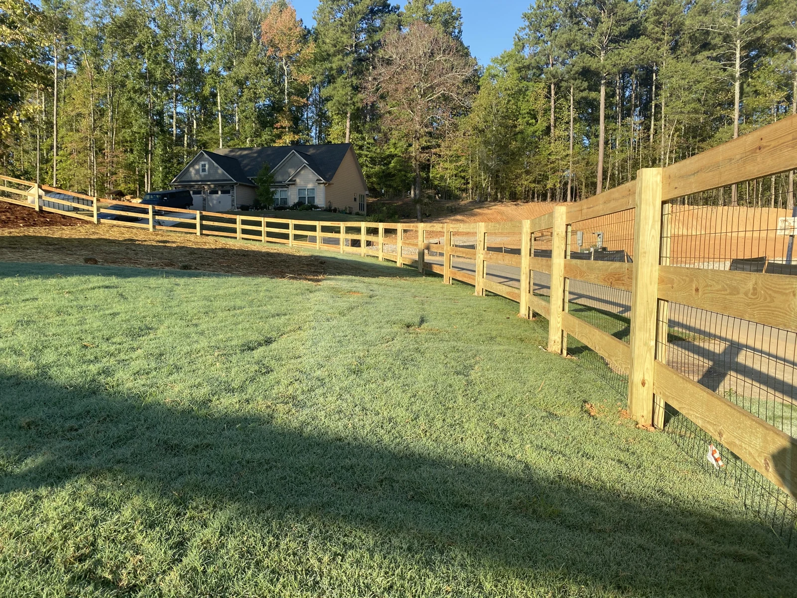 Post-and-board with wire fence or gate design reference