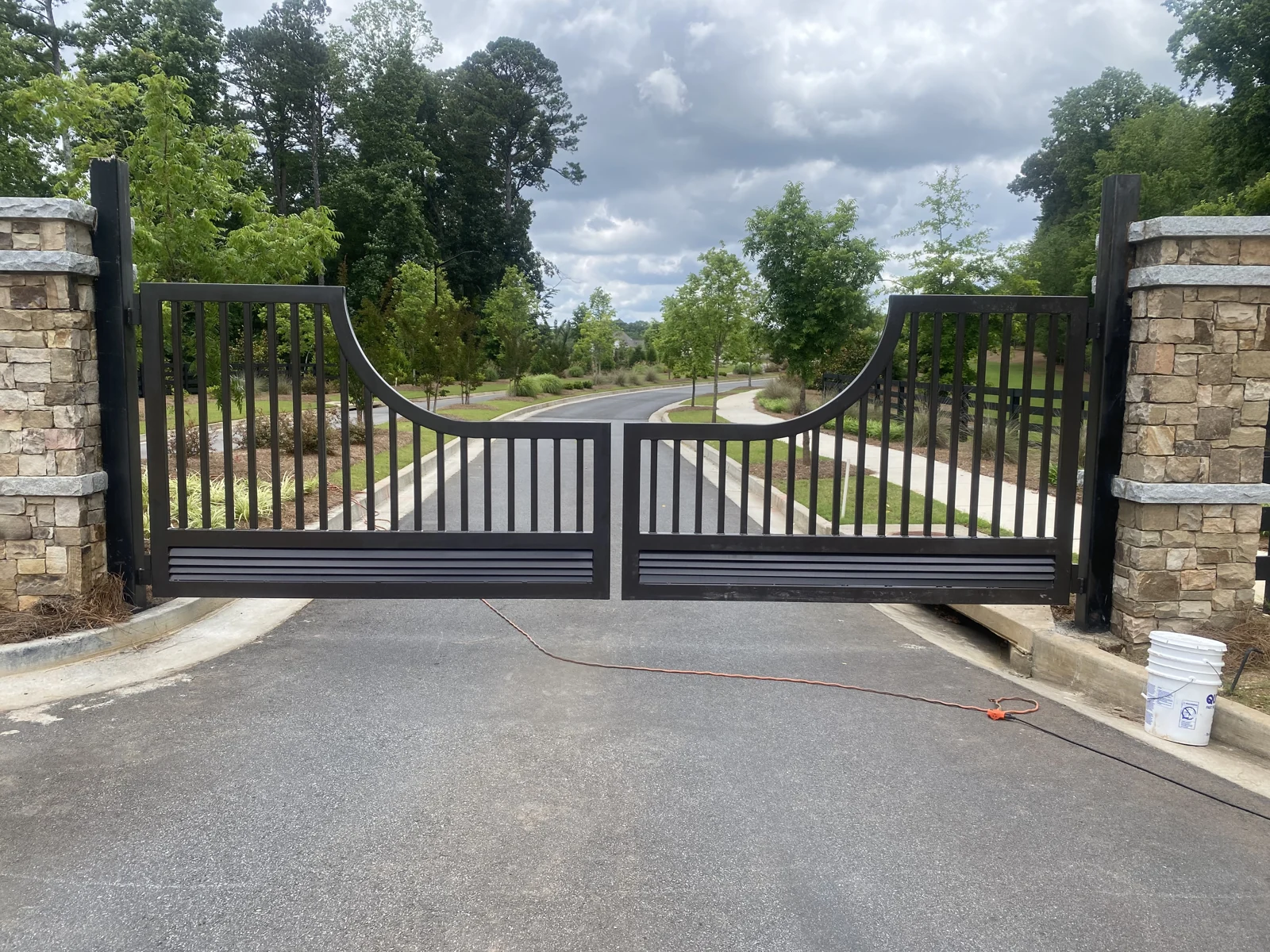 Curved ornamental driveway gates fence or gate design reference