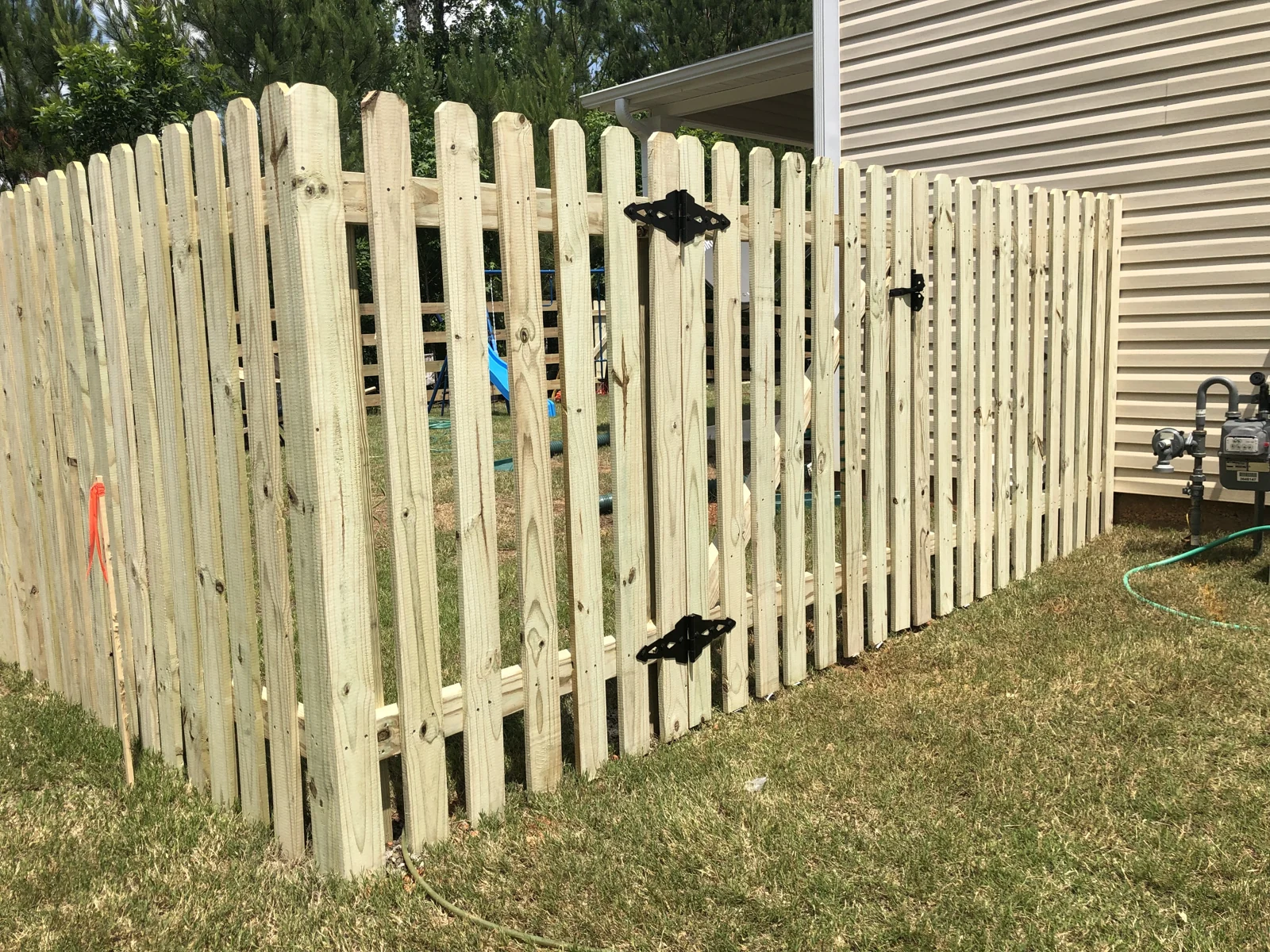 Spaced pickets with a walk gate fence or gate design reference