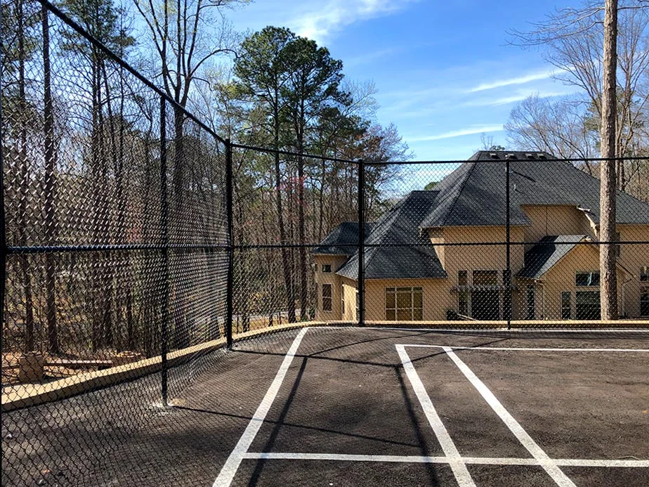 Coated chain-link fence at a residential yard