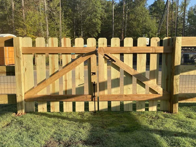Paired wood picket gates