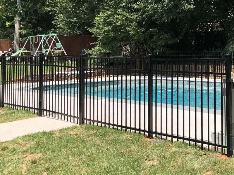 Open-view fence following a pool patio