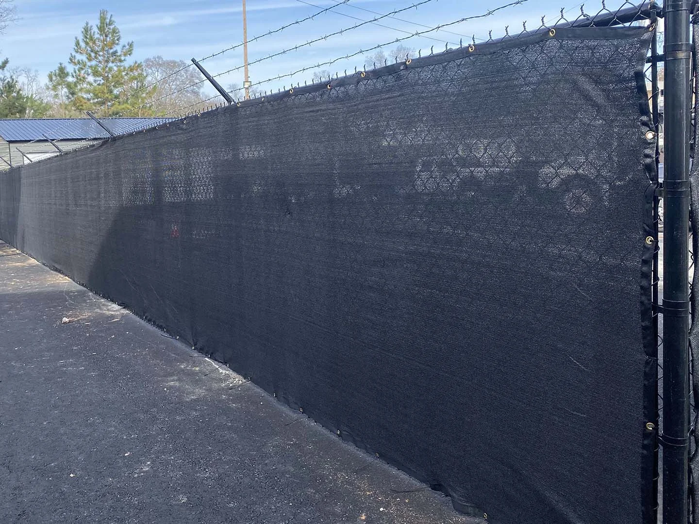 Long screened chain-link perimeter