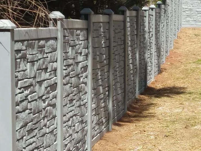 Textured privacy panels along a property line