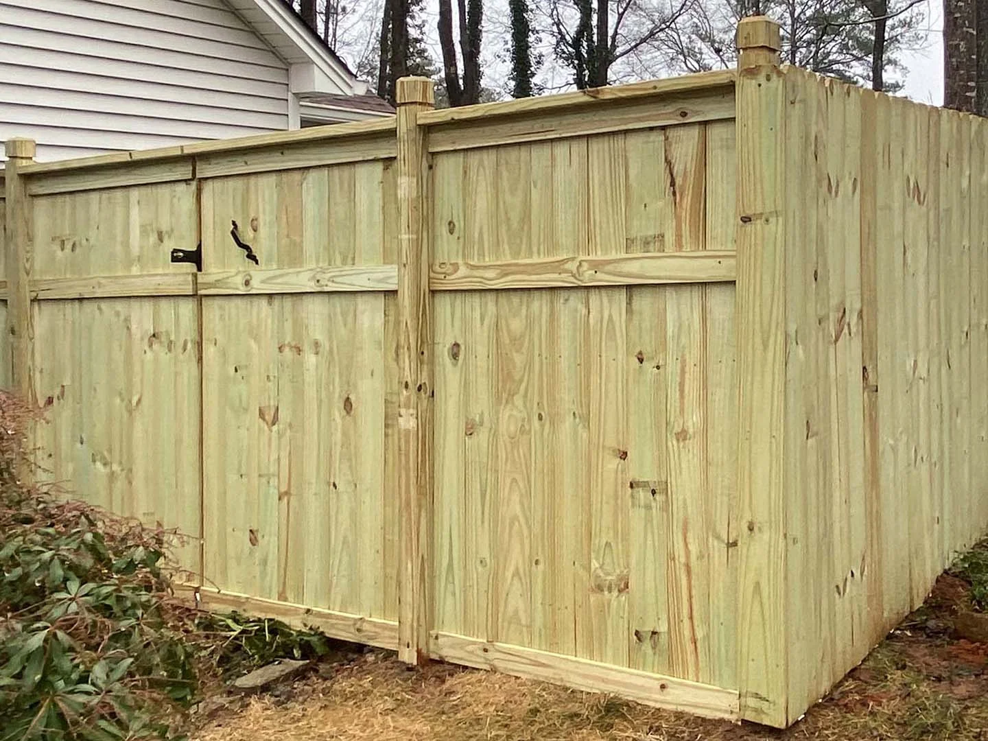 Wood walk gate showing rear rails and framing